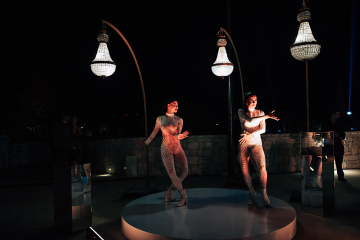 Concert crowd with raised hands